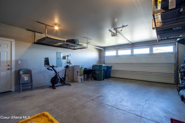 4447 N Connery Loop, Post Falls, ID 83854 - garage featuring electric panel and a garage door opener