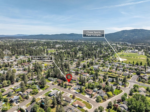 407 W Musket Ave, Post Falls, ID 83854 - aerial perspective of suburban area featuring a mountain backdrop