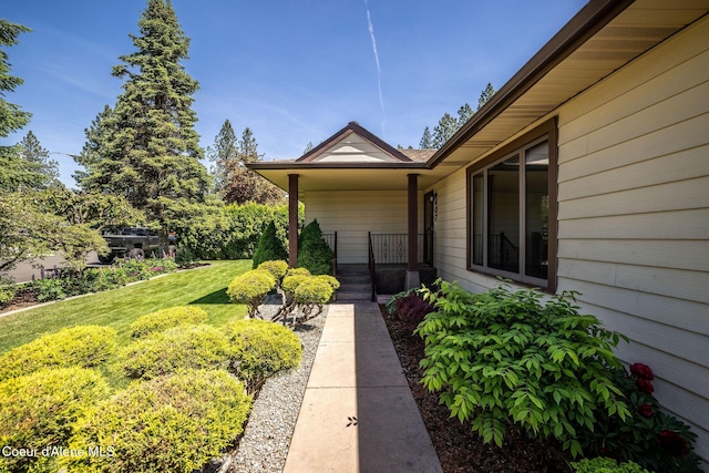 407 W Musket Ave, Post Falls, ID 83854 - view of grassy yard with covered porch