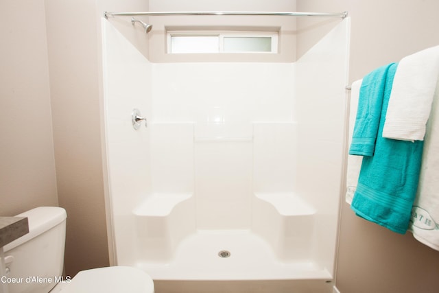 2142 W Cholet Ln, Coeur Dalene, ID 83815 - full bathroom featuring a shower and toilet