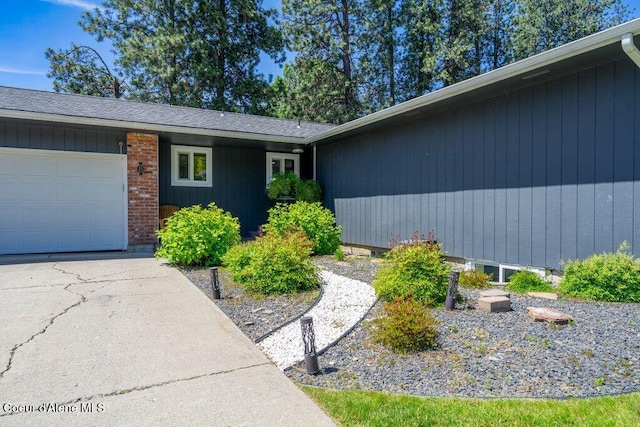 3623 W Hillcrest Cir, Coeur Dalene, ID 83815 - entrance to property with a garage