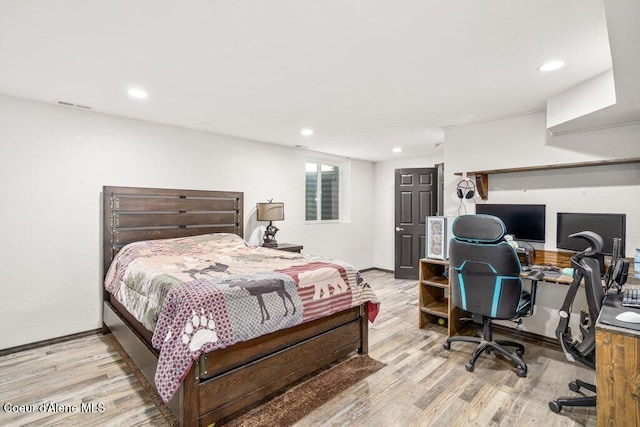 3623 W Hillcrest Cir, Coeur Dalene, ID 83815 - bedroom featuring wood finished floors, a desk, recessed lighting, and baseboards