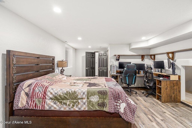 3623 W Hillcrest Cir, Coeur Dalene, ID 83815 - bedroom featuring wood finished floors, recessed lighting, and a desk