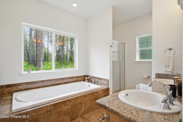 29808 N Caribou Ave, Athol, ID 83801 - bathroom featuring healthy amount of natural light, a stall shower, and a bath