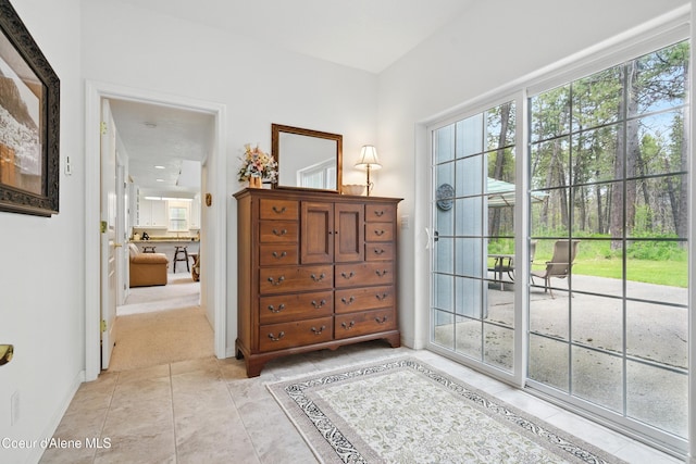 29808 N Caribou Ave, Athol, ID 83801 - bedroom with multiple windows, access to outside, and light tile patterned flooring