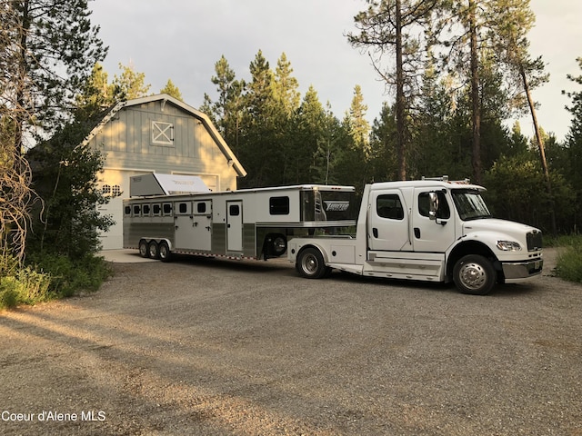 29808 N Caribou Ave, Athol, ID 83801 - view of car parking featuring a barn and a garage