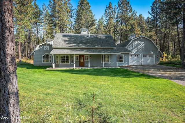 29808 N Caribou Ave, Athol, ID 83801 - view of front facade featuring a front lawn, covered porch, and a shingled roof