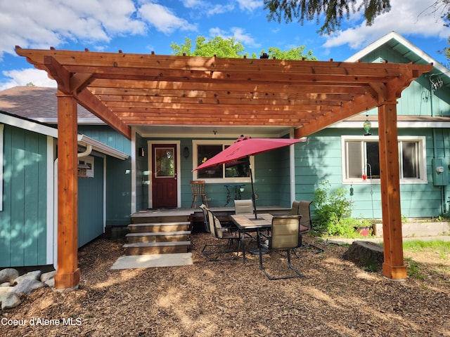 16488 N Atlas Rd, Rathdrum, ID 83858 - rear view of house featuring a pergola