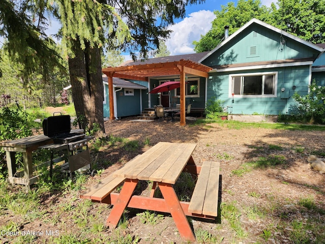 16488 N Atlas Rd, Rathdrum, ID 83858 - back of property featuring a pergola