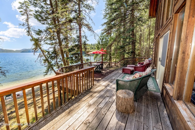 90 Bartoo Is Shr, Priest Lake, ID 83856 - wooden deck with a water view