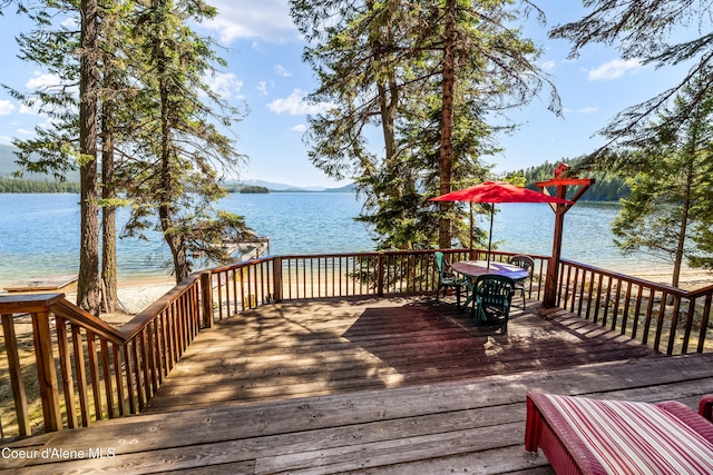 90 Bartoo Is Shr, Priest Lake, ID 83856 - wooden terrace featuring a water view