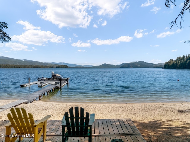90 Bartoo Is Shr, Priest Lake, ID 83856 - dock area with a water and mountain view and boat lift