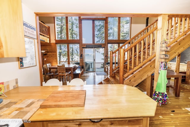 90 Bartoo Is Shr, Priest Lake, ID 83856 - dining room with stairs, hardwood / wood-style floors, and a towering ceiling