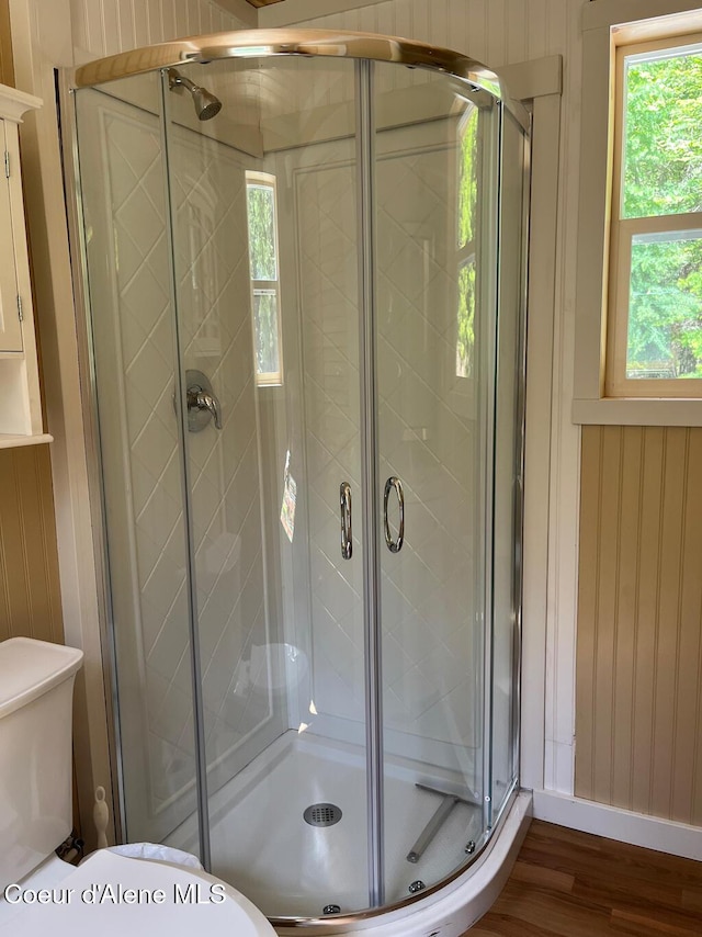191 Sunset View Ln, Hope, ID 83836 - bathroom with toilet, wood finished floors, and a shower stall
