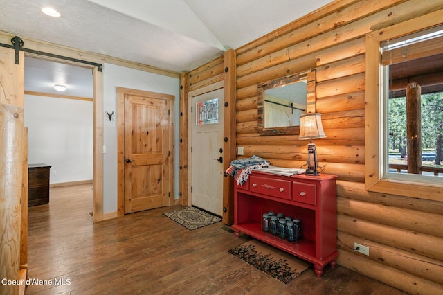 27294 N Clagstone Rd, Athol, ID 83801 - foyer featuring hardwood / wood-style flooring, baseboards, and lofted ceiling
