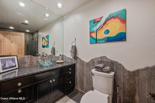 27294 N Clagstone Rd, Athol, ID 83801 - bathroom featuring vanity, toilet, and recessed lighting