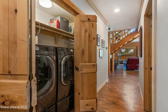 27294 N Clagstone Rd, Athol, ID 83801 - washroom featuring washer and dryer, hardwood / wood-style floors, baseboards, and recessed lighting