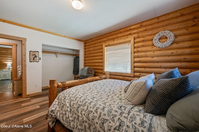 27294 N Clagstone Rd, Athol, ID 83801 - bedroom with wood finished floors, baseboards, and a closet