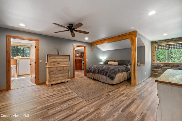 27294 N Clagstone Rd, Athol, ID 83801 - bedroom with wood finished floors, recessed lighting, baseboards, and multiple windows