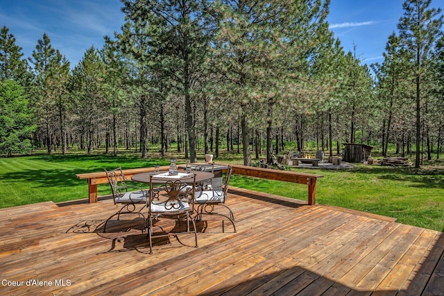27294 N Clagstone Rd, Athol, ID 83801 - wooden deck with a lawn and outdoor dining area