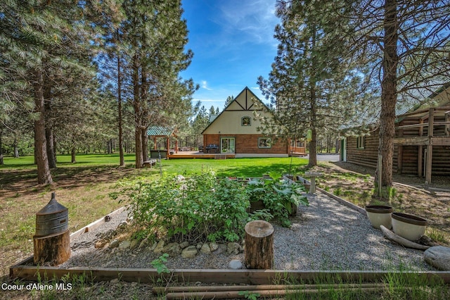 27294 N Clagstone Rd, Athol, ID 83801 - view of grassy yard featuring a deck