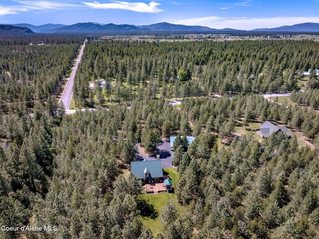 27294 N Clagstone Rd, Athol, ID 83801 - drone / aerial view of a forest and a mountainous background