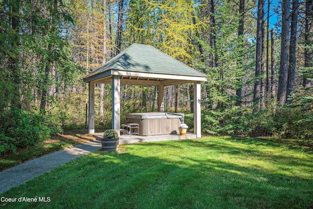 30000 N Caribou Ave, Athol, ID 83801 - view of green lawn with a hot tub, a gazebo, and a wooded view