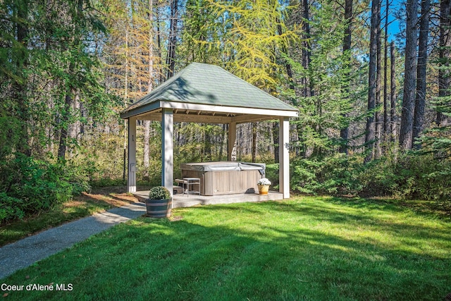 30000 N Caribou Ave, Athol, ID 83801 - view of green lawn with a hot tub, a gazebo, and a view of trees