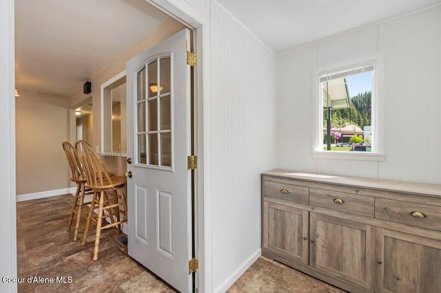 103 3rd St, Wallace, ID 83873 - interior space with baseboards and stone finish flooring