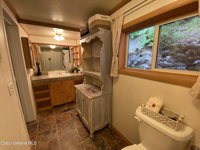 176 King St, Wallace, ID 83873 - bathroom featuring vanity, stone finish flooring, and toilet