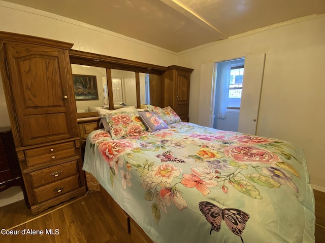 176 King St, Wallace, ID 83873 - bedroom with dark wood finished floors
