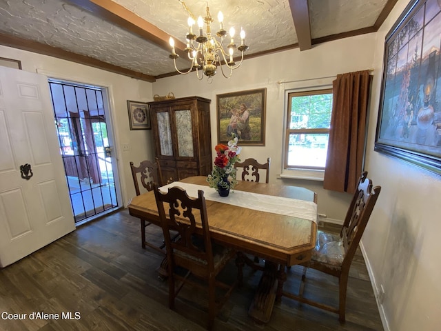 176 King St, Wallace, ID 83873 - dining room with a chandelier, dark wood-type flooring, and baseboards