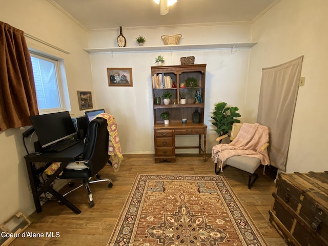 176 King St, Wallace, ID 83873 - home office with wood finished floors and crown molding