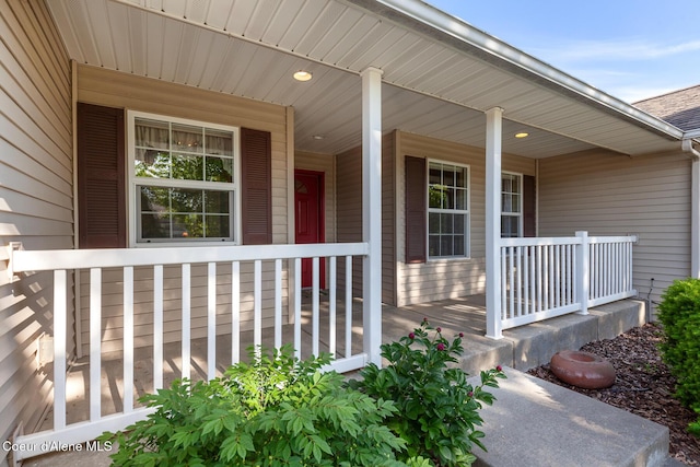 3391 W Loxton Loop, Coeur Dalene, ID 83815 - doorway to property featuring covered porch
