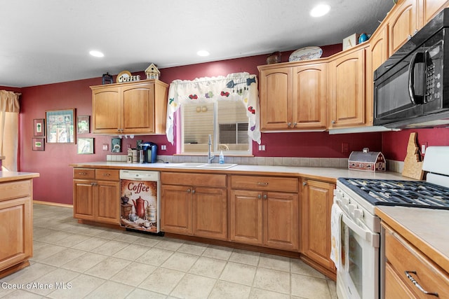 3391 W Loxton Loop, Coeur Dalene, ID 83815 - kitchen featuring white appliances, a sink, light countertops, recessed lighting, and light tile patterned floors