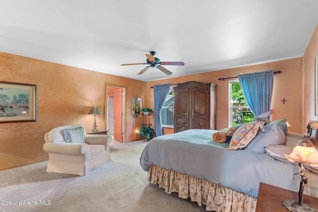 3391 W Loxton Loop, Coeur Dalene, ID 83815 - bedroom featuring light colored carpet and ceiling fan