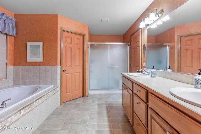 3391 W Loxton Loop, Coeur Dalene, ID 83815 - bathroom featuring double vanity, a shower stall, and a bath