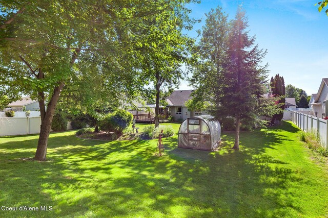 3391 W Loxton Loop, Coeur Dalene, ID 83815 - view of yard with an exterior structure and an outdoor structure
