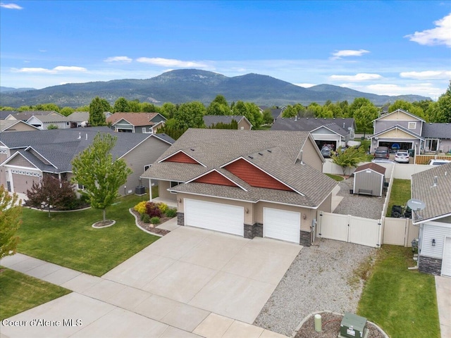 6463 W Conner St, Rathdrum, ID 83858 - aerial view of residential area with a mountainous background