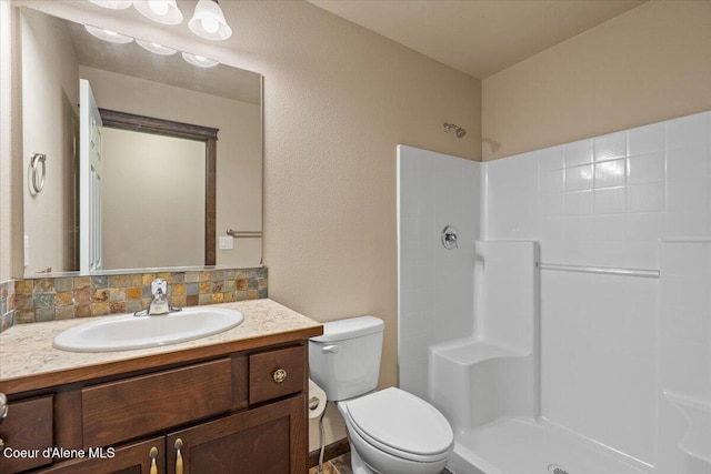 6463 W Conner St, Rathdrum, ID 83858 - bathroom with a shower, vanity, and backsplash