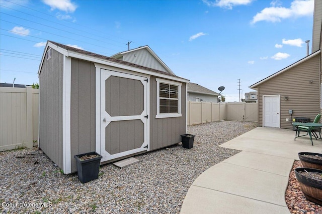 6463 W Conner St, Rathdrum, ID 83858 - view of shed with a fenced backyard