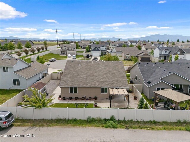 6463 W Conner St, Rathdrum, ID 83858 - aerial view of residential area featuring a mountainous background