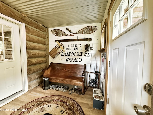 408 Quartz Crk Rd, Priest River, ID 83856 - sitting room with log walls and wood finished floors