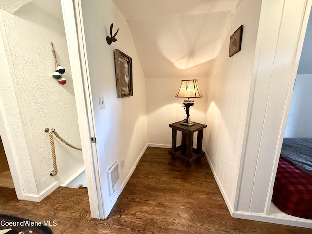 408 Quartz Crk Rd, Priest River, ID 83856 - hall with dark wood-style floors, lofted ceiling, and baseboards
