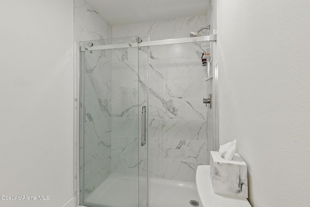 2946 E Point Hayden Dr, Hayden Lake, ID 83835 - full bathroom featuring a marble finish shower