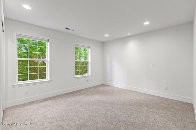 2946 E Point Hayden Dr, Hayden Lake, ID 83835 - carpeted spare room featuring baseboards and recessed lighting