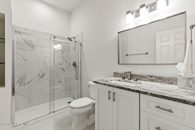 2946 E Point Hayden Dr, Hayden Lake, ID 83835 - full bathroom with toilet, a marble finish shower, and vanity