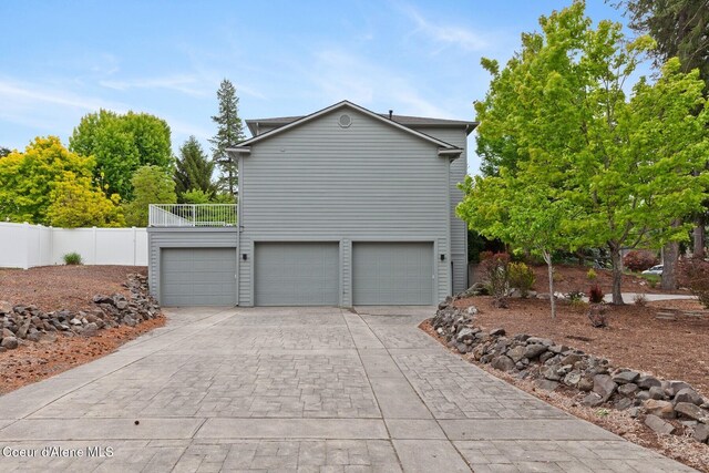2946 E Point Hayden Dr, Hayden Lake, ID 83835 - view of home's exterior featuring driveway and an attached garage