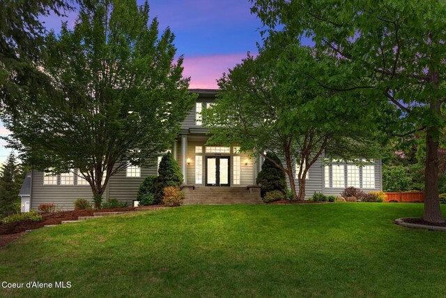 2946 E Point Hayden Dr, Hayden Lake, ID 83835 - obstructed view of property with a front lawn and french doors
