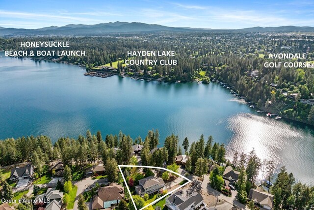 2946 E Point Hayden Dr, Hayden Lake, ID 83835 - aerial perspective of suburban area featuring property boundaries highlighted, a water and mountain view, and a forest